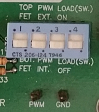 Electronic circuit board with dip switch for PWM control setup, electrical engineering diagram.