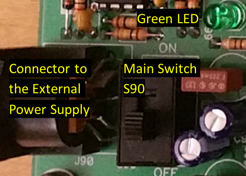 Electronic circuit board with labeled components, featuring a green LED and main switch S90.