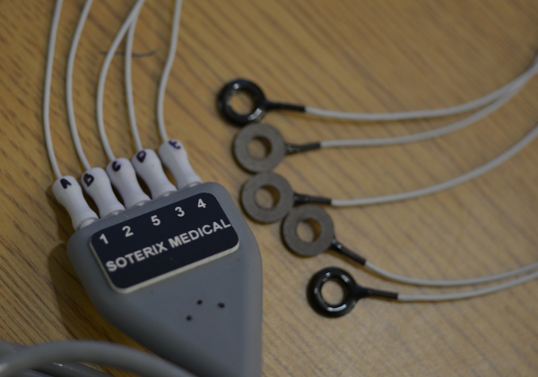 Neurostimulation setup, Soterix Medical device with electrodes, transcranial stimulation process.