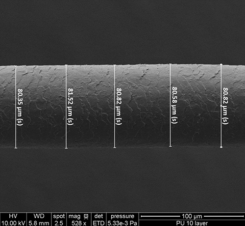 figure-results-4 Scanning electron microscope image of fiber cross-section dimensions, showing uniformity measurements.