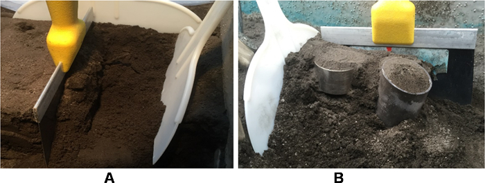 Soil compaction test setup; soil in containers, leveling tools for density and consistency analysis.