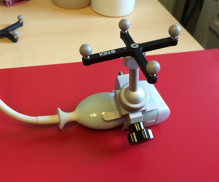 Static equilibrium setup with gimbal mount; mechanical balance demonstration in lab experiment.