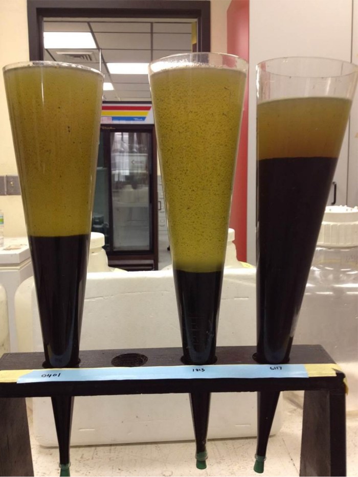 Separation funnel setup; liquid-liquid extraction; phase separation experiment; lab analysis.
