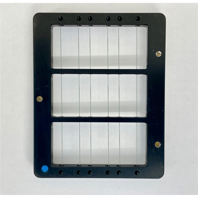 figure-protocol-2 Electrophoresis gel comb in frame, setup for DNA separation experiment, lab equipment.
