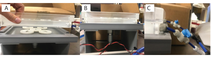 figure-results-3 Electrophoresis setup with fluidic connections, gel tray placement, power leads visible; protein separation.