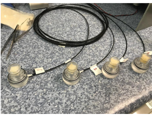 figure-results-6 Spectroscopy setup with optical fibers for transient absorption measurement on lab bench.