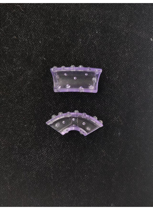 Orthodontic aligner trays, transparent dental devices for teeth alignment, top and bottom view.