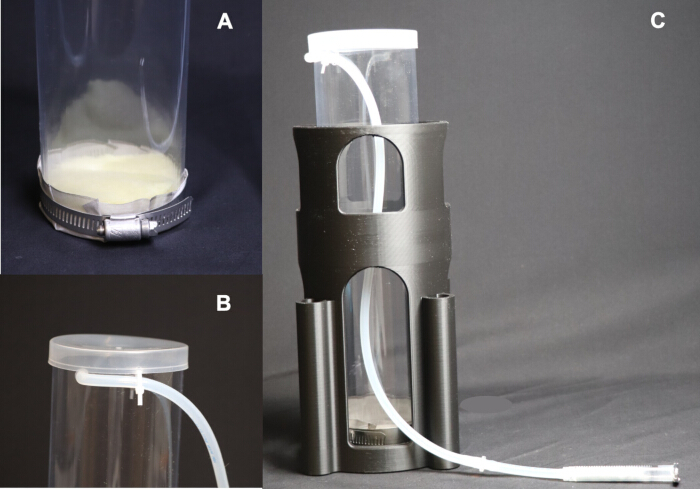 Filtration setup: fluid separation using gravity; diagram with tubing and container system.