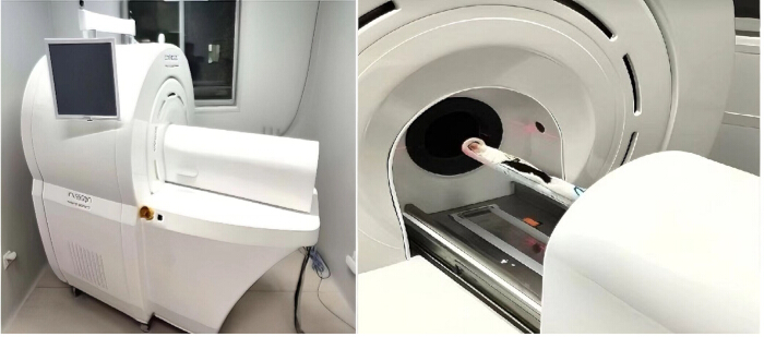 MRI scanner setup for imaging diagnostics; equipment detail and sample loading.